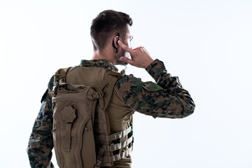 soldier preparing gear for action and checking communication