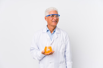 Mature chemical man isolated happy, smiling and cheerful.