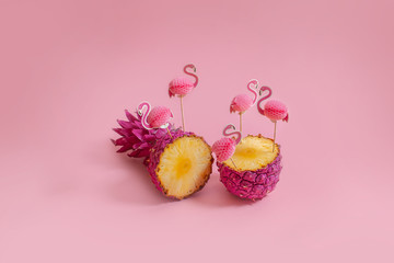 Bright pineapple with pink flamingo. Creative concept of summer party drinks 