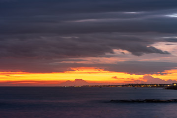 Naklejka na ściany i meble Beautiful sunset on the coast of Bari, Adriatic Sea.