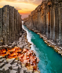 Breathtaking view of Studlagil basalt canyon, Iceland, Europe. - obrazy, fototapety, plakaty