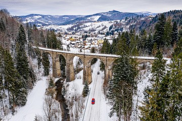 Aerial drone view on railway viaduct at winter