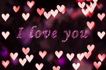 Sign 'I Love You' with heart bokeh background