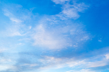 background light cirrus clouds on blue sky.