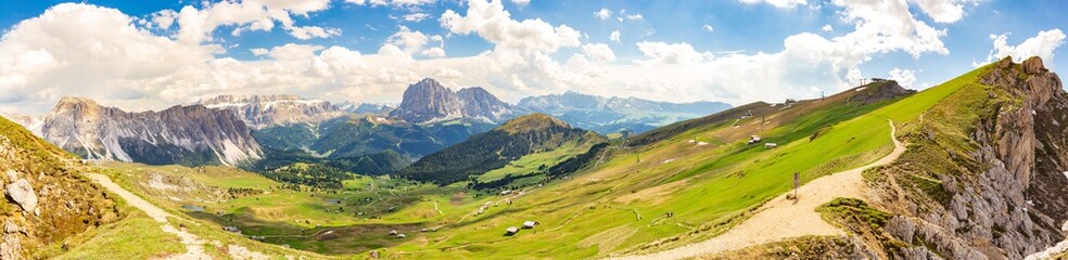 Amazing panoramic view from Seceda park on Dolomites Alps, Odle - Geisler mountain group, Secede peak and Seiser Alm (Alpe Siusi). Selva di val gardena, Trentino Alto Adige, South Tyrol, Italy, Europe - obrazy, fototapety, plakaty