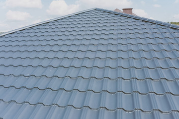 Corrugated metal roof and metal roofing. Modern roof made of met