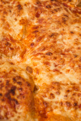 Pizza with cheese close up