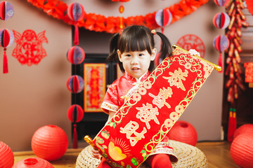 Chinese toddler girl  traditional dressing up with a 