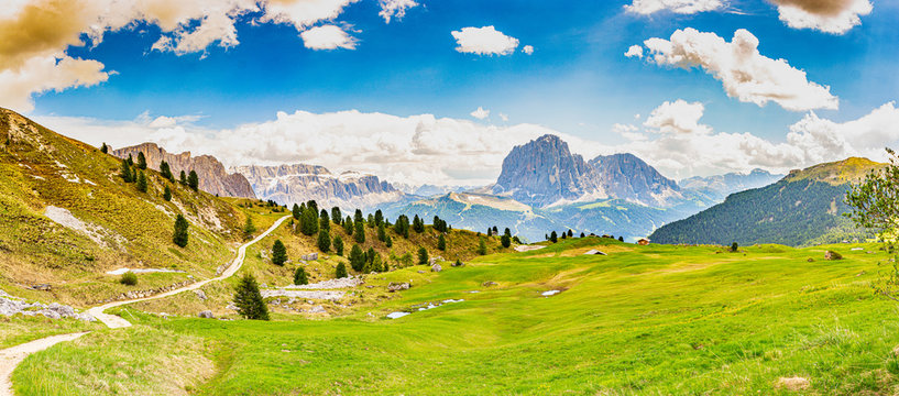 Amazing panoramic view from Seceda park on Dolomites Alps, Odle - Geisler mountain group, Secede peak and Seiser Alm (Alpe Siusi). Selva di val gardena, Trentino Alto Adige, South Tyrol, Italy, Europe