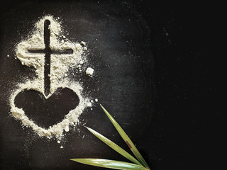 Lent Season,Holy Week and Good Friday concepts - Image of ash in shape of heart and cross with palm...
