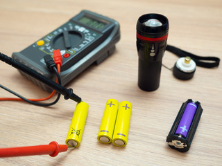 Check battery charge with a multimeter.