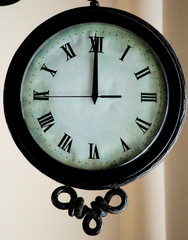 Twelve o´clock at an old fashioned clock