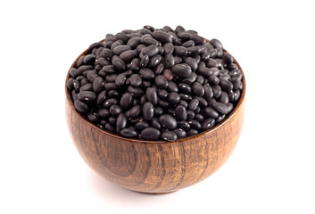 Bowl of Dry Black Beans Isolated on a White Background