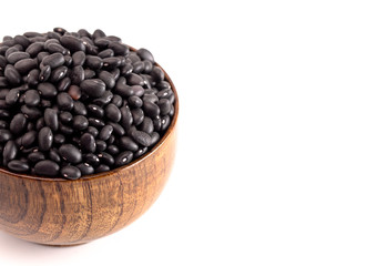 Bowl of Dry Black Beans Isolated on a White Background