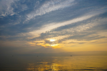 Obraz premium gorgeous Golden super sunset on a blue calm lake