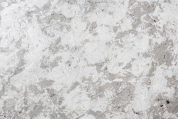 Textured rough grunge gray wall background with imitation of concrete made of surface primer