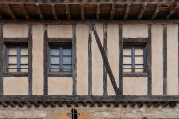 Carcassonne city timbered house in medieval town.