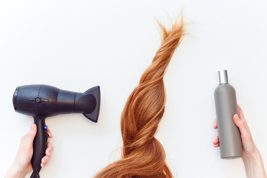 How To Care For Your Hair Using A Hair Dryer. Which Shampoo To Choose. Red Hair And Woman Holding Hair Dryer And Shampoo Bottle On White