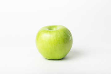 Natural, fresh whole green apples Isolated on a white background. non-gmo healthy vegetarian eating concept
