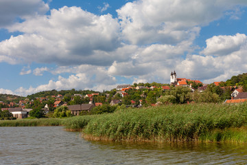 Obraz premium Tihany village with the abbey and the innert lake in the front with reed at Lake Balaton, Hungary