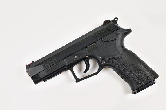 A semi-automatic pistol 9mm luger on a white background