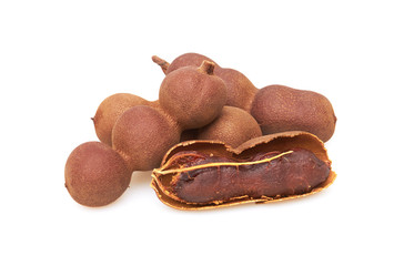 Fresh tamarind fruit on white