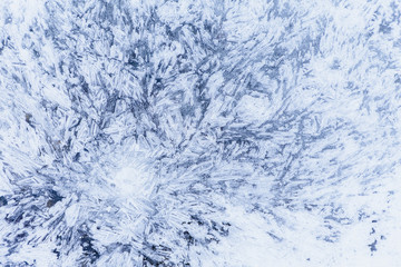 Ice texture, interesting frozen lake patterns, naturally created forms. Frozen river's water in the winter in mount Vitosha, near Sofia, Bulgaria. Ice Age climate changes.