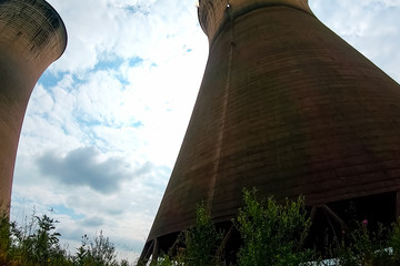 Old cooling towers of closed nuclear power plant.