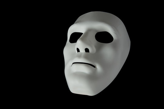White mask in different light and perspectives.