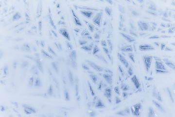 Ice texture, interesting frozen lake patterns, naturally created forms. Frozen river's water in the winter in mount Vitosha, near Sofia, Bulgaria. Ice Age climate changes.