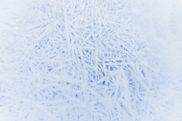 Ice texture, interesting frozen lake patterns, naturally created forms. Frozen river's water in the winter in mount Vitosha, near Sofia, Bulgaria. Ice Age climate changes.