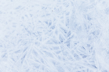 Ice texture, interesting frozen lake patterns, naturally created forms. Frozen river's water in the winter in mount Vitosha, near Sofia, Bulgaria. Ice Age climate changes.