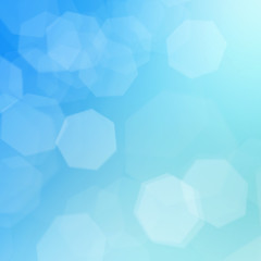 Blue bokeh lights abstract background. Bokeh on the background blurred the natural blue and white.