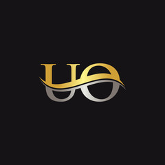 Gold And Silver letter UO Logo Design with black Background. UO Letter Logo Design