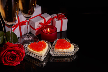 Champagne, red caviar and gifts. Valentine's day