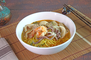 Tom Yum seafood noodle, Thai food.
