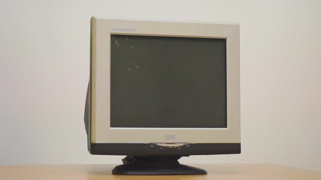 Old retro CRT monitor computer that are broken or not used or obsolete. Rotation