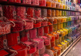 Rainbow of candy on wall