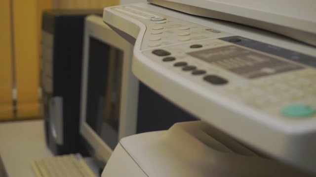 Old office equipment. Old desktop computer and old copy machine