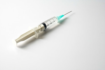 Medical concept with syringe for vaccination isolated on white.