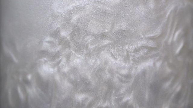 Rheoscopic fluid. Beautiful movement of particles in a liquid. Fantastic patterns and shapes. 50 fps