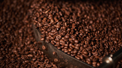 Brown roasted coffee. Close up.