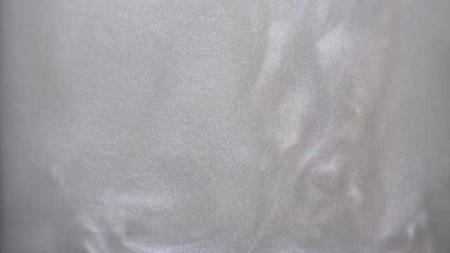 Rheoscopic fluid. Beautiful movement of particles in a liquid. Fantastic patterns and shapes. 50 fps
