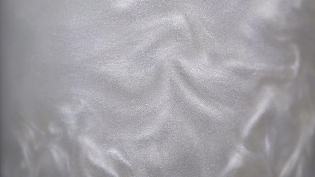 Rheoscopic fluid. Beautiful movement of particles in a liquid. Fantastic patterns and shapes. 50 fps