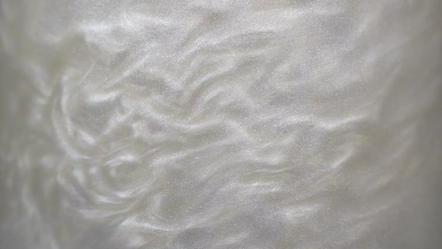 Rheoscopic fluid. Beautiful movement of particles in a liquid. Fantastic patterns and shapes. 50 fps