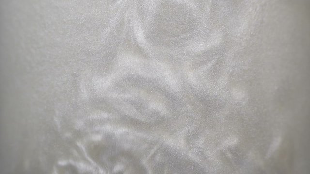 Rheoscopic fluid. Beautiful movement of particles in a liquid. Fantastic patterns and shapes. 50 fps