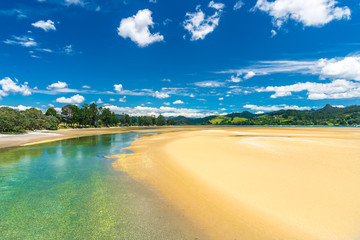 sand beach ocean and blue sky