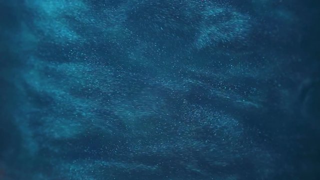 Rheoscopic fluid. Beautiful movement of particles in a liquid. Fantastic patterns and shapes. 50 fps