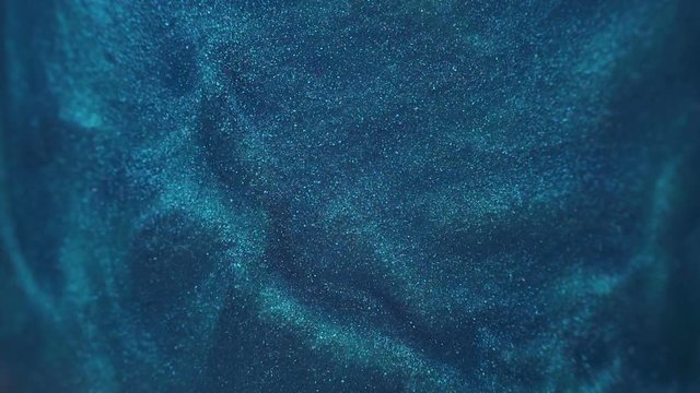 Rheoscopic fluid. Beautiful movement of particles in a liquid. Fantastic patterns and shapes. 50 fps