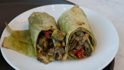Vegetable wraps served on white porcelaine plate